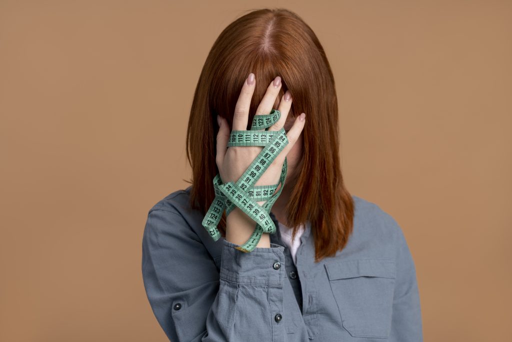 woman with eating disorder having weight problems